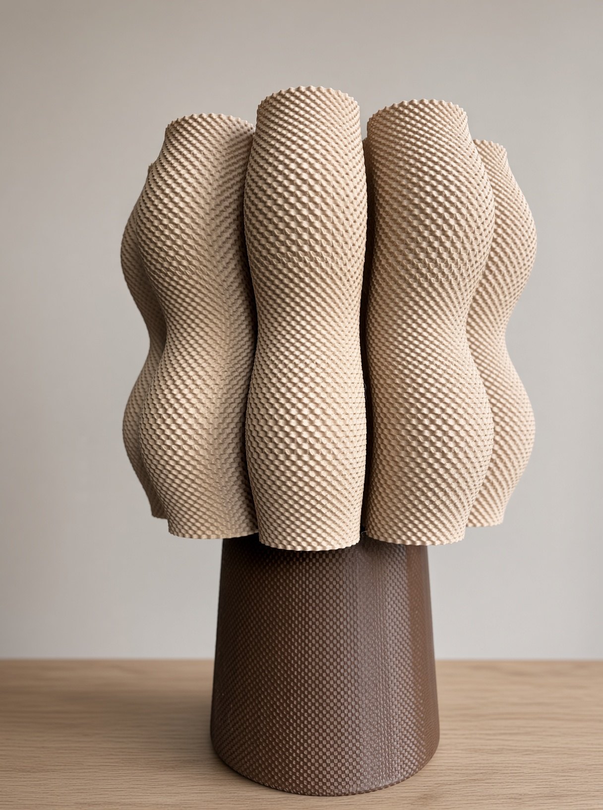 Cocoa lamp: a beige sculptural shade on a brown base